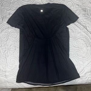 Lululemon Athletica black shirt with see through detail in the bottom